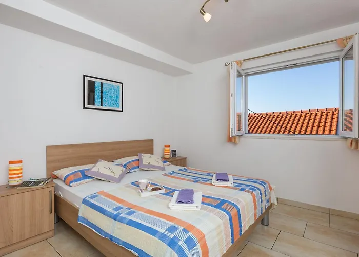 Апартаменты Lovro - Duplex One Bedroom With Terrace And Partial Sea View 1 *